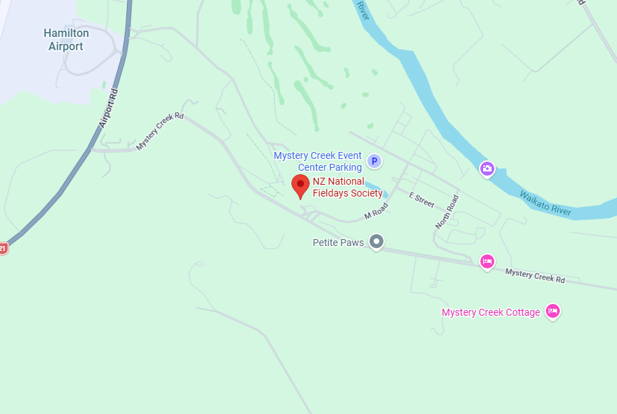 Map showing the location of NZ National Fieldays Society near Mystery Creek Road, with nearby landmarks including Hamilton Airport, Mystery Creek Event Center Parking, Petite Paws, and Mystery Creek Cottage, along the Waikato River.